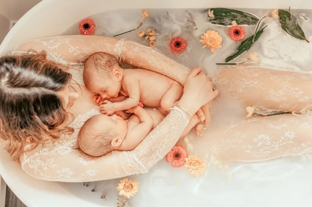 milk bath photoshoot with new born Twins